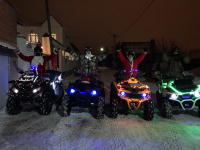 Волгоградцев поздравили Дед Мороз и Снегурочка на квадрациклах